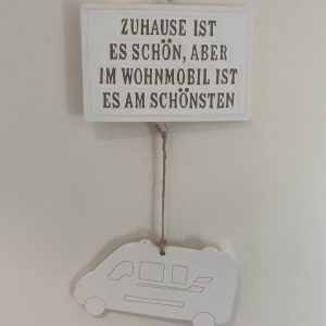 Skylt tyska: Zuhause ist es schön, aber im Wohnmobil ist es am schönsten
